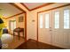 Inviting foyer with tile floors, white trim, and a view into the living room at 506 Deerberry Dr, Noblesville, IN 46062