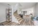 Open basement featuring carpeted stairs, an open playroom, gray walls and vinyl floors at 5073 St Charles Pl, Carmel, IN 46033