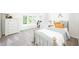 Cozy bedroom with a large window, dresser, and cheerful decorations at 5073 St Charles Pl, Carmel, IN 46033