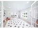 Bright bedroom with built-in shelving, a large window, and neutral decor, perfect for relaxation at 5073 St Charles Pl, Carmel, IN 46033