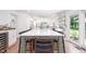 Bright kitchen with large island, marble countertops, and stainless steel appliances at 5073 St Charles Pl, Carmel, IN 46033