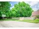 Neighborhood street view with basketball hoop and manicured lawn, highlighting curb appeal at 5073 St Charles Pl, Carmel, IN 46033