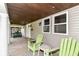 Charming front porch with seating area, perfect for relaxing and enjoying the outdoors at 518 N Emerson Ave, Indianapolis, IN 46219