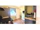 Cozy kitchen featuring a stainless steel sink and granite countertops at 518 N Emerson Ave, Indianapolis, IN 46219
