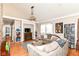 Cozy living room with a fireplace, hardwood floors, and comfortable seating, offering a relaxing atmosphere at 518 N Emerson Ave, Indianapolis, IN 46219