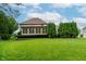 Expansive backyard featuring green lawn and privacy landscaping at 5251 Apache Moon, Carmel, IN 46033