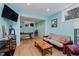Basement living area with a ping pong table and light blue walls at 5251 Apache Moon, Carmel, IN 46033