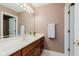 Bathroom with an extended vanity, mirror, overhead lights and tile flooring at 5251 Apache Moon, Carmel, IN 46033