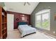 This bedroom features a large window and a closet with overhead lighting at 5251 Apache Moon, Carmel, IN 46033