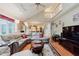 Spacious living room has hardwood floors and an open floor plan that allows for seamless flow into the kitchen and dining areas at 5251 Apache Moon, Carmel, IN 46033