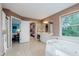 The main bathroom has a soaking tub, a walk-in shower, and dual sink vanity at 5251 Apache Moon, Carmel, IN 46033