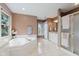 Spacious main bathroom features a large soaking tub and walk-in shower at 5251 Apache Moon, Carmel, IN 46033