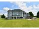 Expansive backyard and patio are shown on this home's rear exterior at 5758 N 900 W, Thorntown, IN 46071