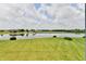 Expansive view of the lush backyard that goes down to a gorgeous lake at 5758 N 900 W, Thorntown, IN 46071