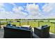 Scenic deck with comfortable seating and views of the serene lake and property at 5758 N 900 W, Thorntown, IN 46071