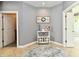 Cozy foyer featuring a stylish accent table, decorative elements, and views of the nearby rooms at 5758 N 900 W, Thorntown, IN 46071