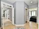Hallway view with entrances to living room, sunroom and Primary bedroom at 5758 N 900 W, Thorntown, IN 46071