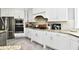 Well-equipped kitchen featuring stainless steel appliances, granite countertops, and sleek white cabinetry at 5758 N 900 W, Thorntown, IN 46071