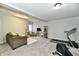 Bright recreation room with exercise equipment, carpet, and modern design elements for a balanced and inviting space at 5758 N 900 W, Thorntown, IN 46071