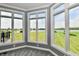 This bright sunroom has views of a pond, green space, and a patio area at 5758 N 900 W, Thorntown, IN 46071
