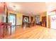 Spacious dining area features hardwood floors, room for a large dining table, and great natural light at 5821 Bittersweet Rd, Morgantown, IN 46160