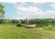 Scenic lakefront property with a dock, complete with kayaks for enjoying the tranquil waters at 5821 Bittersweet Rd, Morgantown, IN 46160