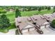Stunning aerial view showcasing townhome with two-car garage, lush greenery and golf course views at 608 Cielo Vista Dr, Greenwood, IN 46143