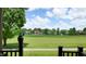 Scenic view of the lush backyard and neighborhood, seen from the balcony, offering a serene and peaceful setting at 608 Cielo Vista Dr, Greenwood, IN 46143