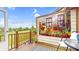 Charming balcony with seating, a floral wall decor, and scenic views of the surrounding landscape at 608 Cielo Vista Dr, Greenwood, IN 46143