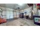 Spacious two car garage with workbench, fridge, and concrete flooring at 608 Cielo Vista Dr, Greenwood, IN 46143