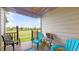 Comfortable outdoor patio with cozy seating and views of a lush green lawn at 608 Cielo Vista Dr, Greenwood, IN 46143