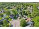 An aerial view of a residential home in a well-maintained neighborhood, pinpointed with a house icon at 7061 Woodgate Cir, Fishers, IN 46038
