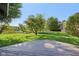 A spacious, green backyard landscape is visible from the wood deck at 7061 Woodgate Cir, Fishers, IN 46038