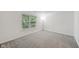 Bright bedroom with neutral carpet, large window and natural light at 7061 Woodgate Cir, Fishers, IN 46038