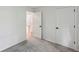 Bedroom featuring neutral carpet and white trim at 7061 Woodgate Cir, Fishers, IN 46038