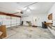 Well-lit garage space with concrete floor and a clean, organized appearance at 7061 Woodgate Cir, Fishers, IN 46038