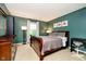 This bedroom features charming decor, a cozy bed, and warm natural light at 73 Spring Lake Dr, Westfield, IN 46074