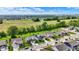 Aerial view of the neighborhood showcasing the home among green spaces and other residential properties at 7319 Farlin Dr, Whitestown, IN 46075
