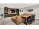 Finished basement featuring a media center, custom wood wall, and bar seating at 7319 Farlin Dr, Whitestown, IN 46075