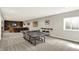 Spacious carpeted basement featuring a recreation area with a ping pong table at 7319 Farlin Dr, Whitestown, IN 46075