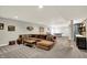 Large basement featuring a sectional couch, ping pong table, and a bar area at 7319 Farlin Dr, Whitestown, IN 46075