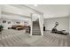 Expansive basement featuring a comfortable seating area, exercise equipment, and an open layout at 7319 Farlin Dr, Whitestown, IN 46075