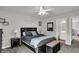 Stylish bedroom with neutral walls, plush bedding, and ample natural light at 7319 Farlin Dr, Whitestown, IN 46075