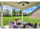 Outdoor patio with seating area and open view of the backyard and sky at 7319 Farlin Dr, Whitestown, IN 46075