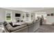Spacious living room featuring neutral colors, a large sectional sofa, and lots of natural light at 7319 Farlin Dr, Whitestown, IN 46075