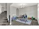 Spacious playroom with a carpet, a large window, and fun decor at 7319 Farlin Dr, Whitestown, IN 46075