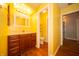 Bathroom with vanity and sink, and a doorway leading to the toilet and shower at 7450 Cotherstone Ct, Indianapolis, IN 46256