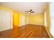 Bright, spacious bedroom featuring wood-look flooring and neutral walls at 7450 Cotherstone Ct, Indianapolis, IN 46256