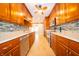 Modern kitchen with stainless steel appliances, tile backsplash, and ample cabinetry at 7450 Cotherstone Ct, Indianapolis, IN 46256