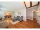 Spacious living room seamlessly connects to the dining area, perfect for entertaining at 7450 Cotherstone Ct, Indianapolis, IN 46256